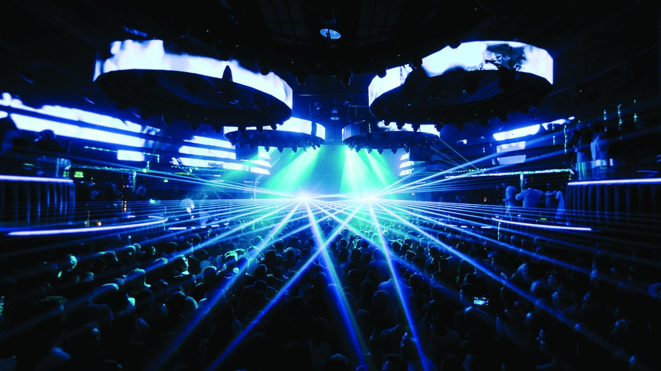 A picture of Hï Ibiza, with blue lights and silver lasers