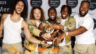 Photo of Ezra Collective celebrating with their mercury prize