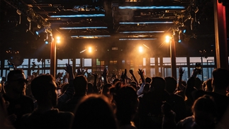 A photo of a crowd inside The Grand Factory