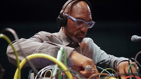 King Britt is pictured using analogue synths